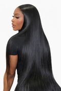 Woman with long, raw indian hair straight black 